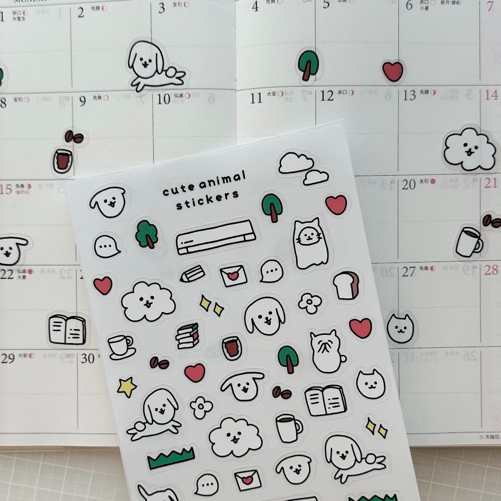 Silhouette CAMEO5で作ったシールを手帳に貼る様子